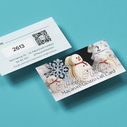Gift card with snowmen design on a blue background