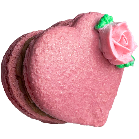 Pink macaron with a pink rose on a white background