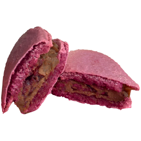 Pink dessert with a brown filling on a white background